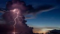 Clear green waves lapped against the white sand. Giant thunderheads rose from the distant horizon, like effervescent volcanoes bursting out of the sea. Forked lightning danced around the tops of...